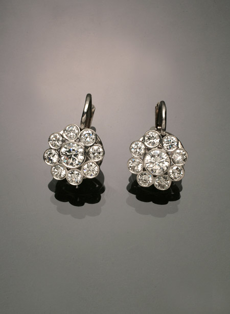 Appraisal: Pair of Platinum and Diamond Pierced Earrings Each set with