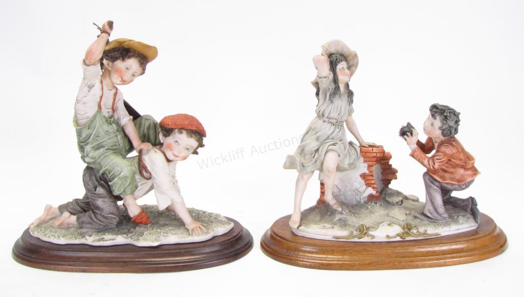 Appraisal: Two Giuseppe Armani Figural Groupings Piggy Back depicting boy with