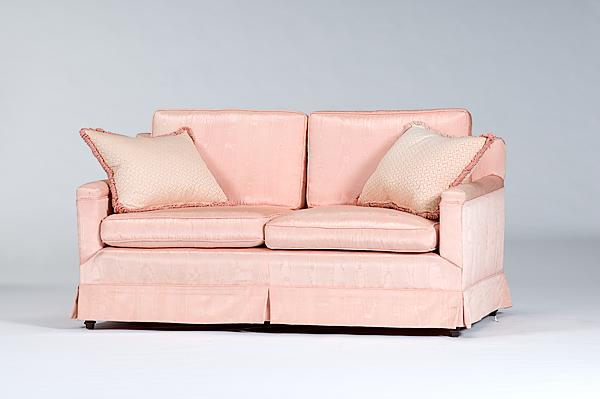 Appraisal: PINK UPHOLSTERED SOFA American late th century A pink upholstered