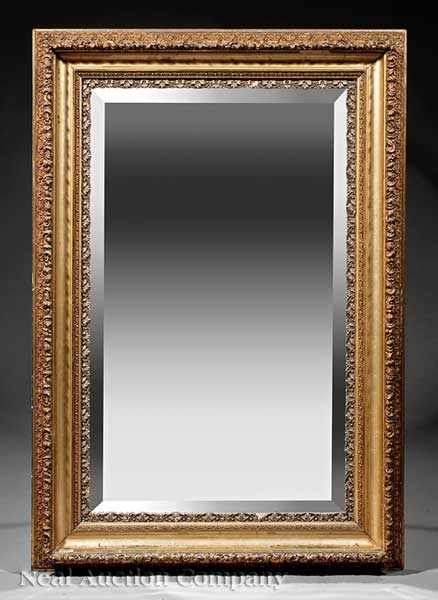 Appraisal: An American Carved Giltwood Mirror th c molded frame with