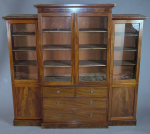 Appraisal: A George IV mahogany breakfront library bookcase the central moulded