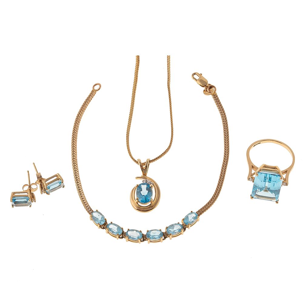 Appraisal: A Suite of Blue Topaz Jewelry Set in K K