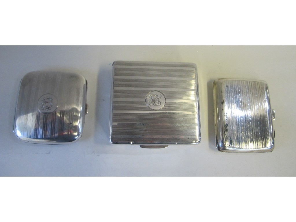 Appraisal: Lot comprising two silver cigarette cases and a silver cigarette