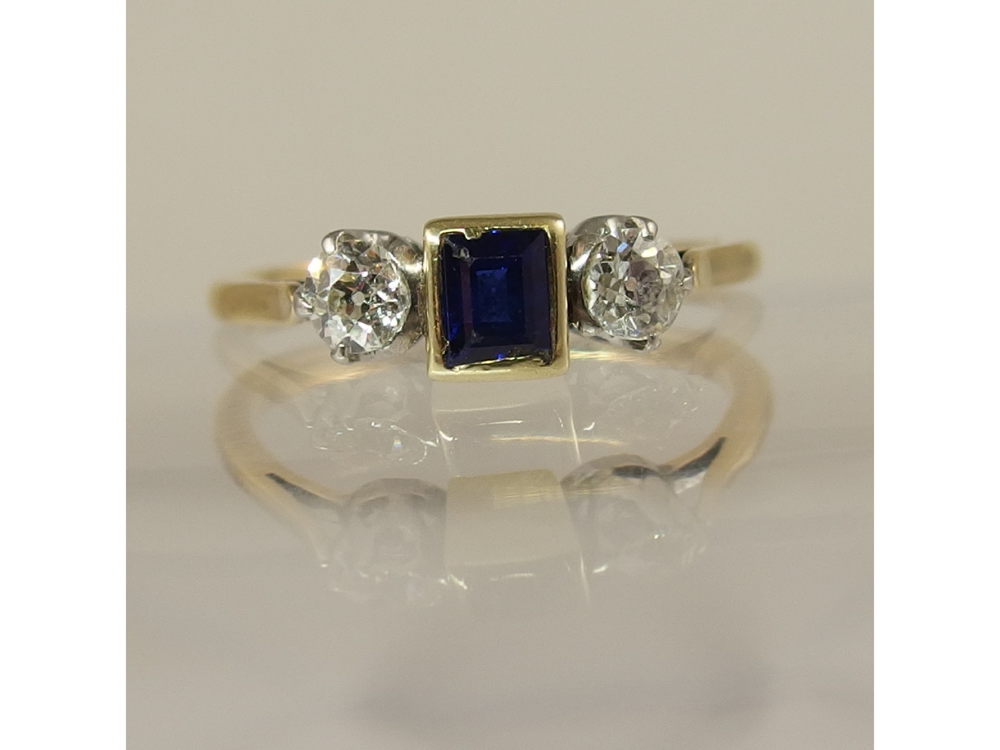 Appraisal: An ct old cut diamond and blue gem stone ring