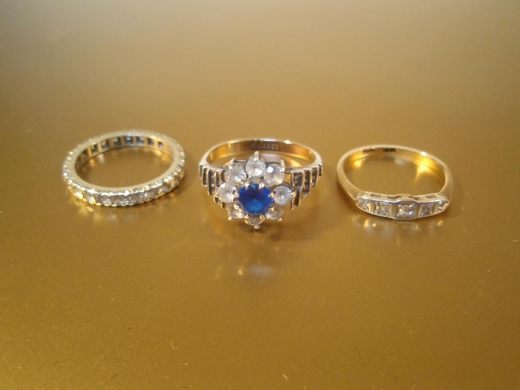 Appraisal: Three stone set dress rings including synthetic spinel in plated