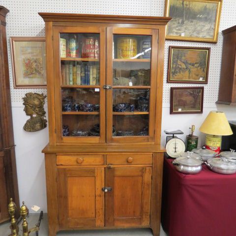 Appraisal: Stepback Cupboard th century glass doors above double drawers and