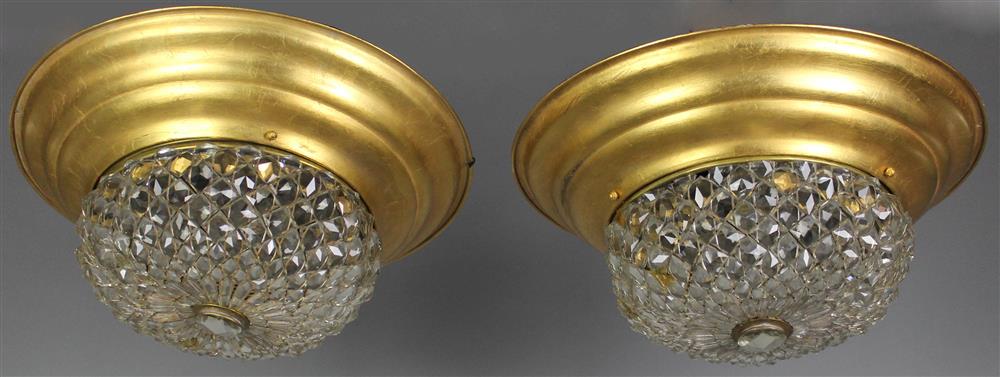 Appraisal: PAIR OF FRENCH GILT METAL AND CUT CRYSTAL CEILING FIXTURES