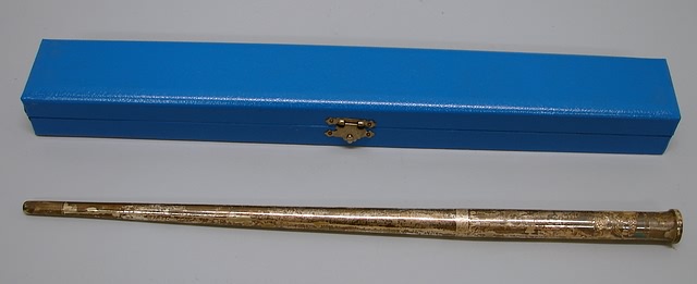 Appraisal: Silver swagger stick with inscribed body featuring dragon and four