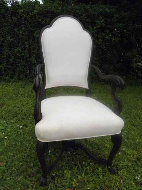 Appraisal: Carved Mahogany arm chair White muslin fabric Condition fabric worn