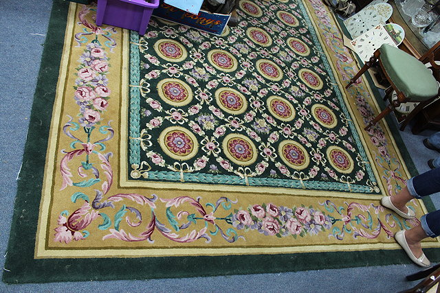 Appraisal: A MODERN TH CENTURY FRENCH STYLE GREEN GROUND CARPET with