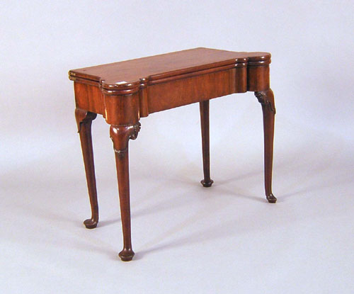 Appraisal: Irish Queen Anne mahogany card table ca with a turret