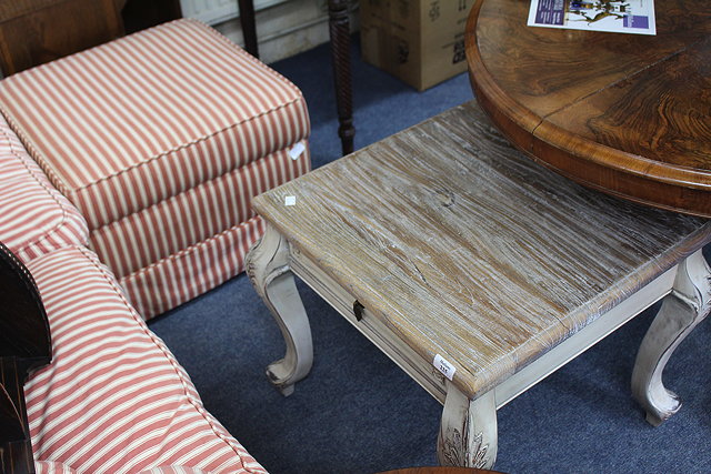 Appraisal: A LOW SQUARE TOPPED CREAM PAINTED OCCASIONAL TABLE with scrub