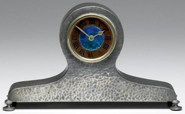 Appraisal: LIBERTY Tudric pewter shelf clock with enameled face Replaced glass