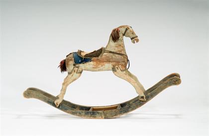 Appraisal: Carved and painted rocking horse second half th century Retains