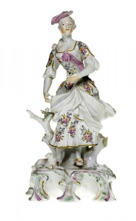 Appraisal: A DERBY FIGURE OF A SHEPHERDESS WITH A LAMB OR