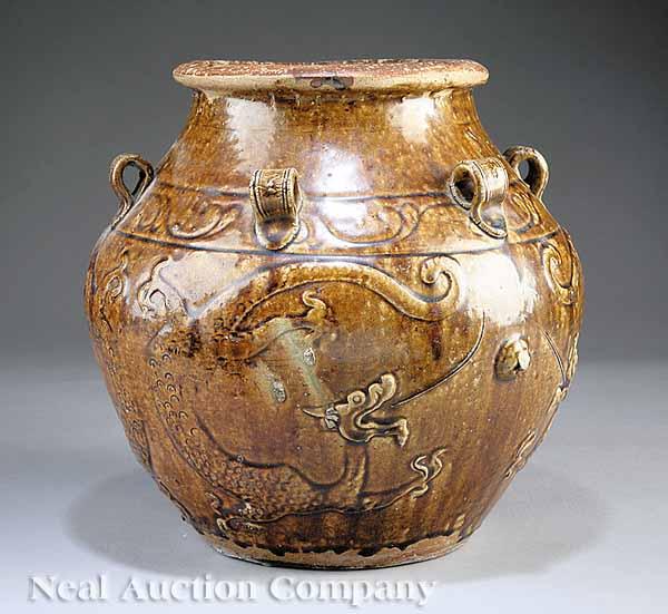 Appraisal: A Southeast Asian Ochre Brown Glazed Ovoid-Form Urn late th