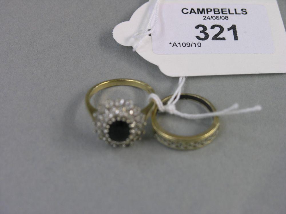 Appraisal: A ct gold cluster ring claw set with numerous clear