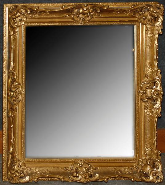 Appraisal: A Victorian molded composition gilt mirror height in width in