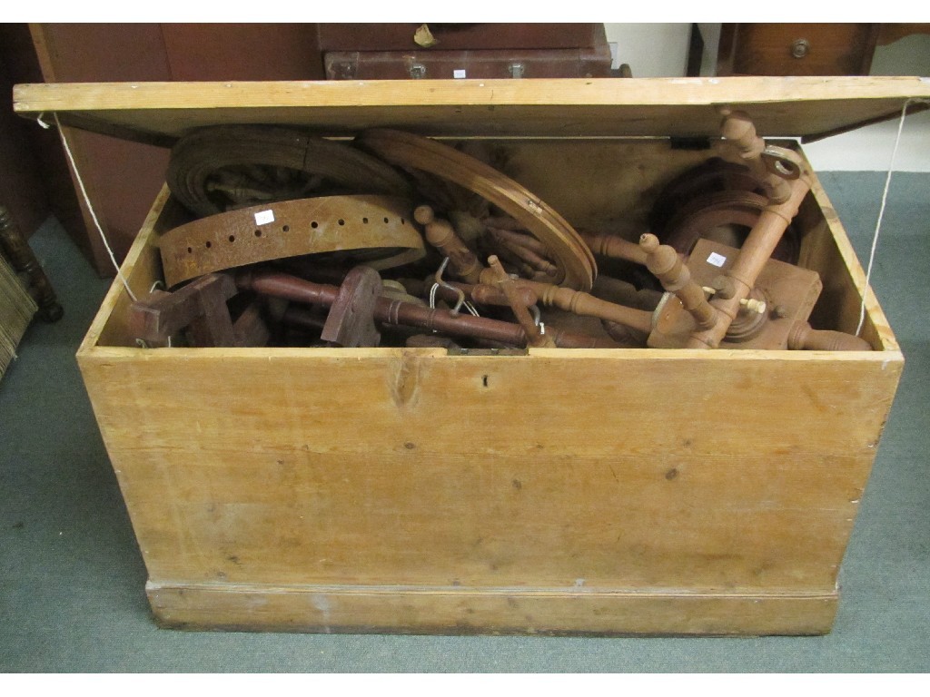 Appraisal: Pine blanket box containing assorted spinning wheel parts