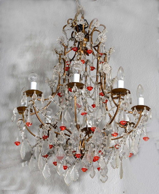 Appraisal: AN EIGHT BRANCH HANGING CHANDELIER with brass frame cut lustre