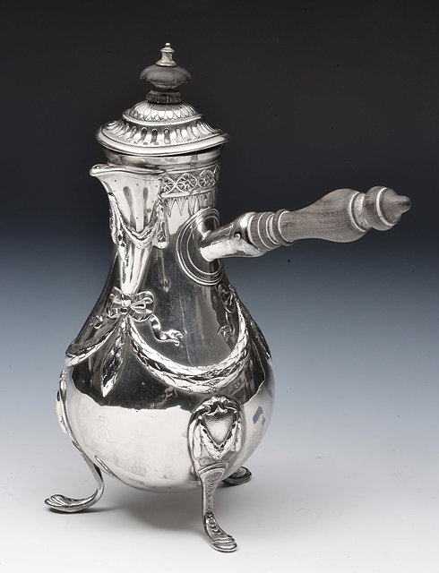 Appraisal: Georgian style silver chocolate potof baluster form with embossed swag