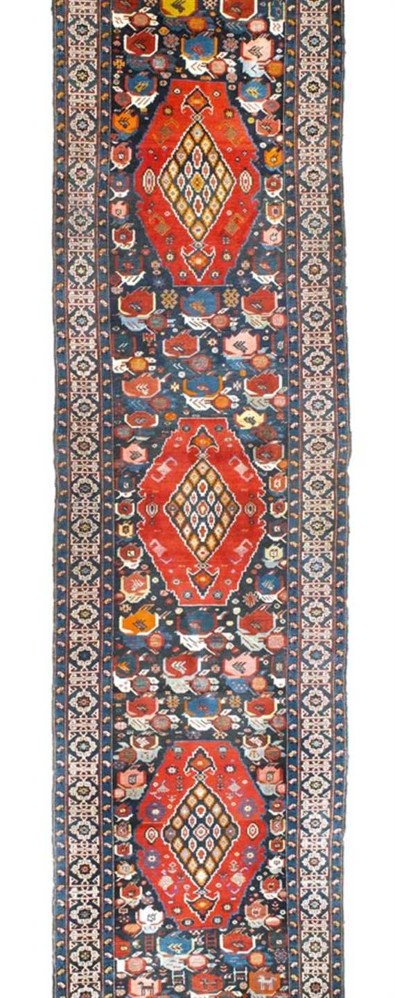 Appraisal: CAUCASIAN RUNNER antique Blue central field with three red medallions