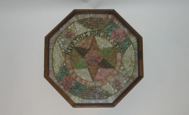 Appraisal: OCTAGONAL SAILORS SHELLWORK VALENTINE Finely detailed centering a six-point star