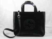 Appraisal: A patent leather Gucci shoulder bag together with a pair