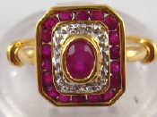 Appraisal: A yellow metal tests carat gold ruby and diamond ring