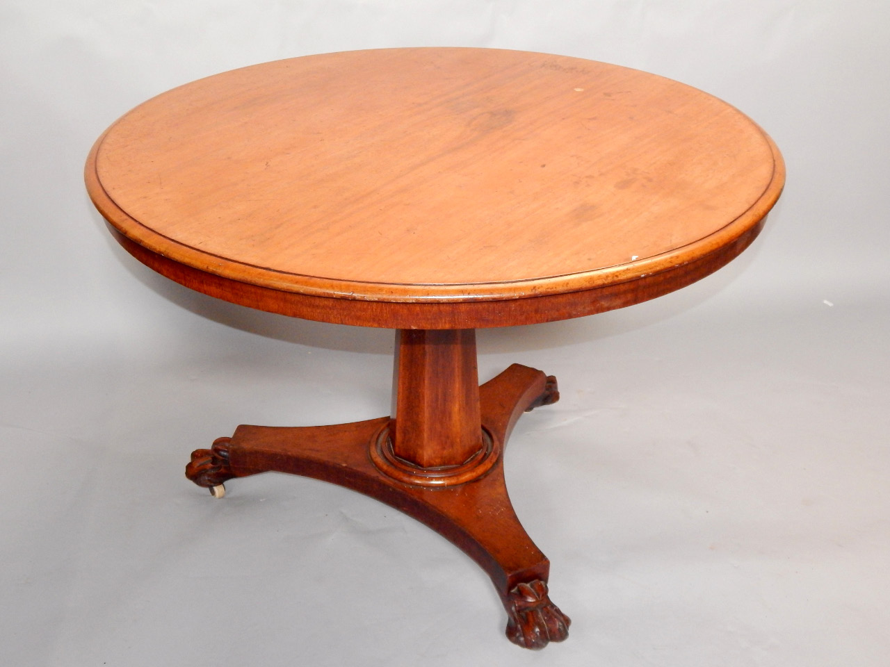 Appraisal: A Victorian mahogany tilt top breakfast table the circular top