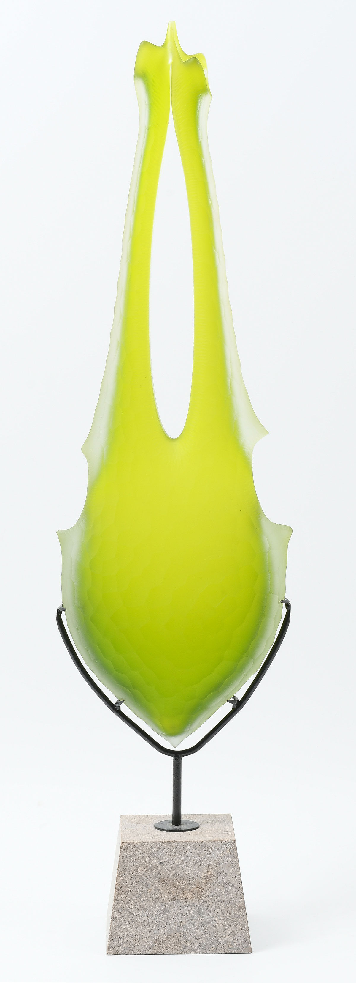 Appraisal: GREENISH-YELLOW ART GLASS SCULPTURE ON STAND Having multi-faceted abstract body