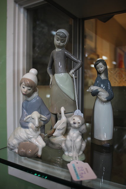 Appraisal: FOUR LLADRO PORCELAIN FIGURINES to include a girl with a