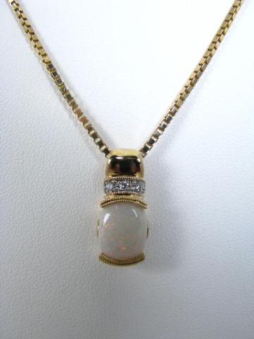 Appraisal: k yellow gold diamond and opal pendant with '' box