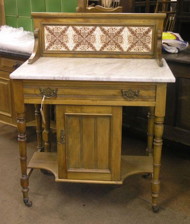 Appraisal: A Victorian beech wash stand marble top with printed tiled