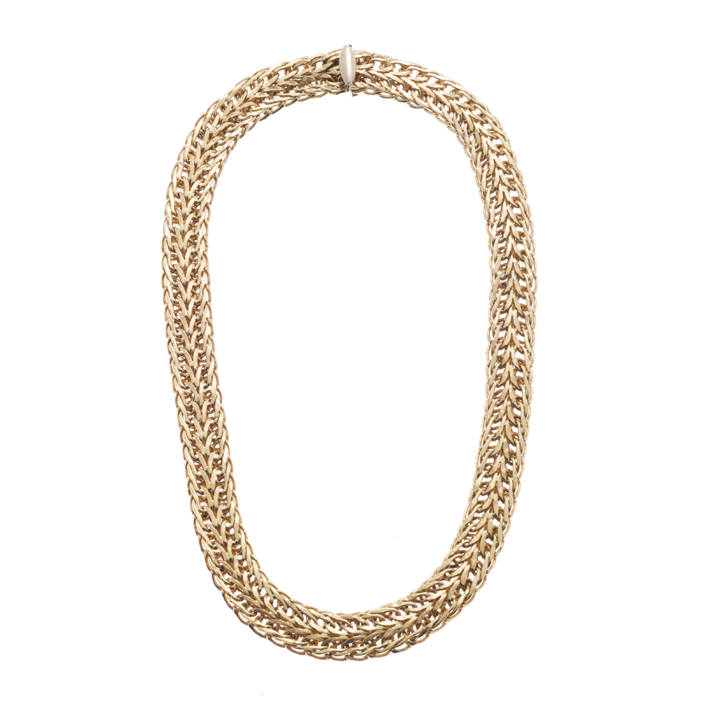 Appraisal: A fancy link necklace composed of a broad band of