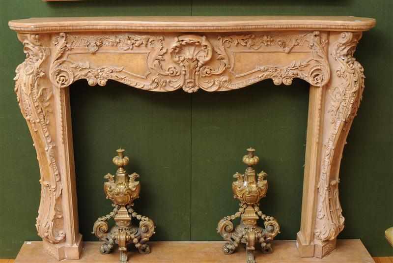 Appraisal: LOUIS XV STYLE MARBELIZED PLASTER CHIMNEYPIECE The serpentine-fronted shelf with