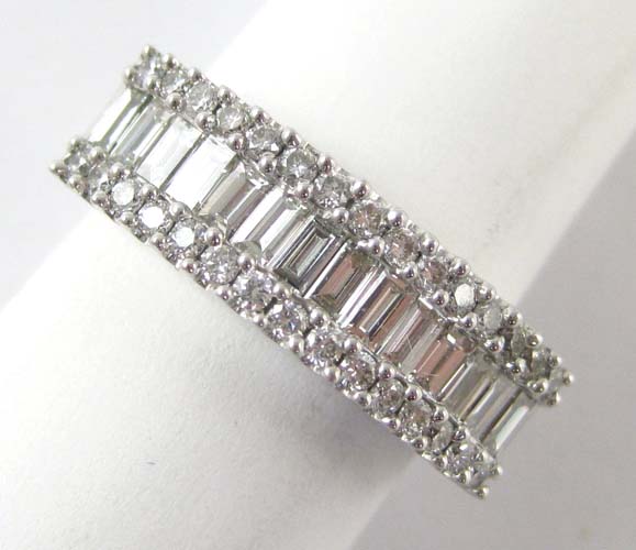 Appraisal: DIAMOND AND FOURTEEN KARAT WHITE GOLD RING with two rows