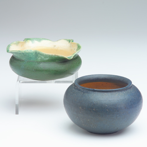 Appraisal: GRUEBY Two squat vessels one covered in matte green glaze