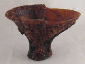 Appraisal: A Chinese carved horn libation cup carved with grapes and