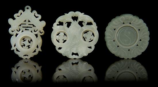 Appraisal: Sale Lot Three Carved Jade Pendants comprising two pale celadon