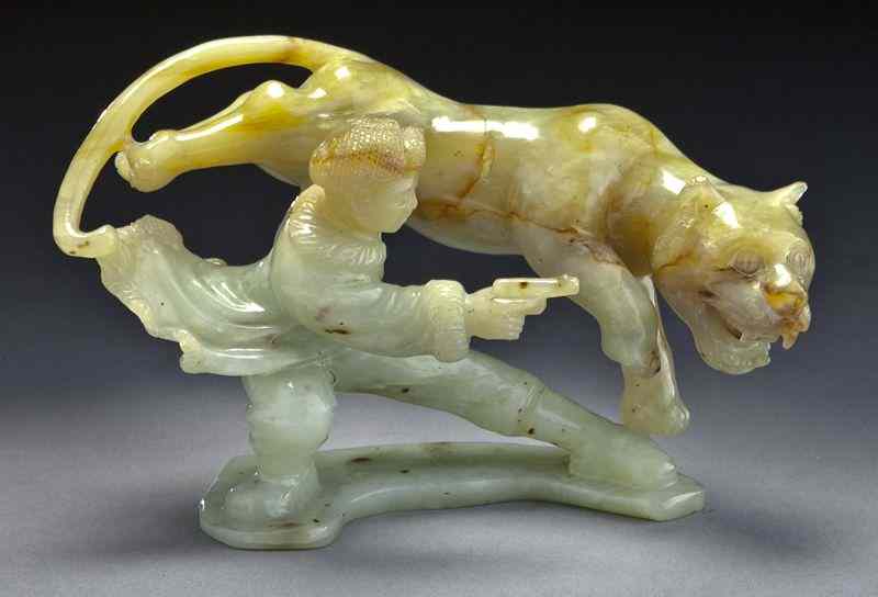 Appraisal: Chinese Cultural Revolution carved serpentinejade figure depicting Yang zirong in