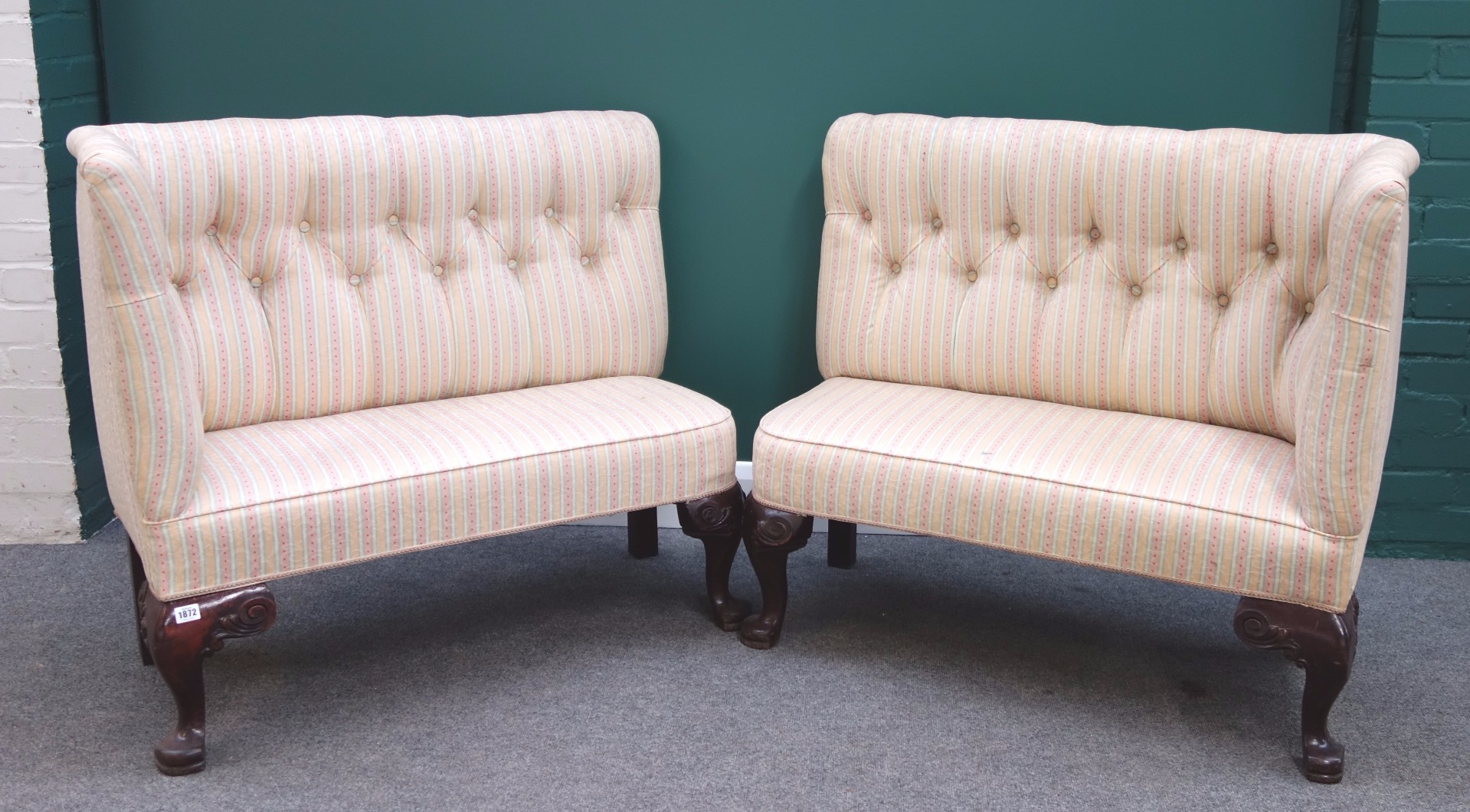 Appraisal: A pair of corner sofas of th century design on