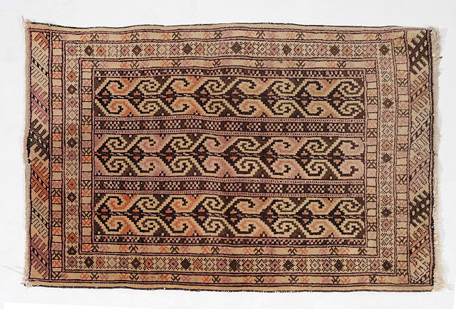 Appraisal: A HAMMADAN RUNNER with central gul decoration on a brown