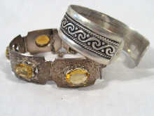 Appraisal: A mixed lot comprising a Middle Eastern silver bangle and