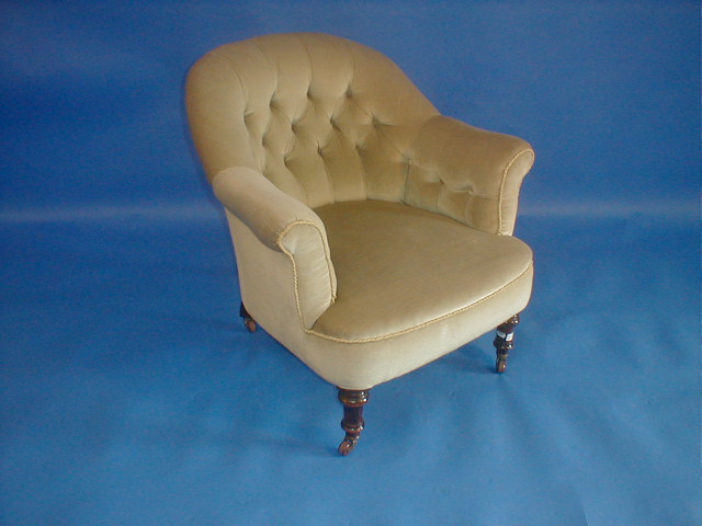 Appraisal: A Victorian tub chair upholstered in green button draylon