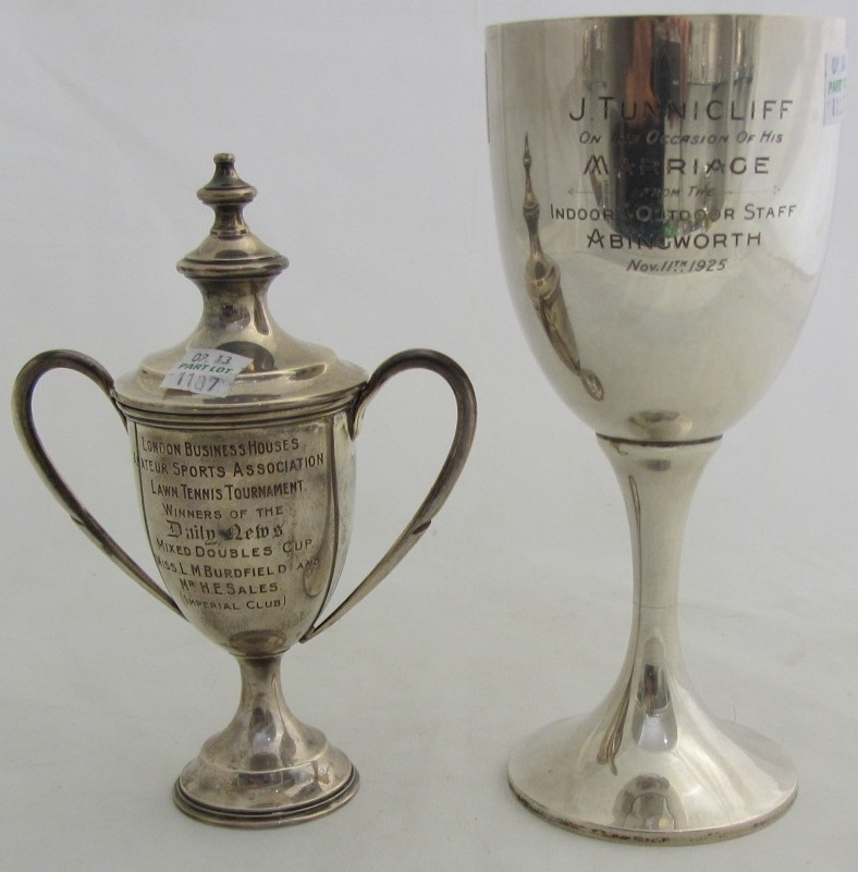 Appraisal: A silver trophy cup on a trumpet shaped circular foot