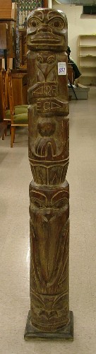 Appraisal: CARVED AND STAINED WOOD TOTEM POLE with stylized human and