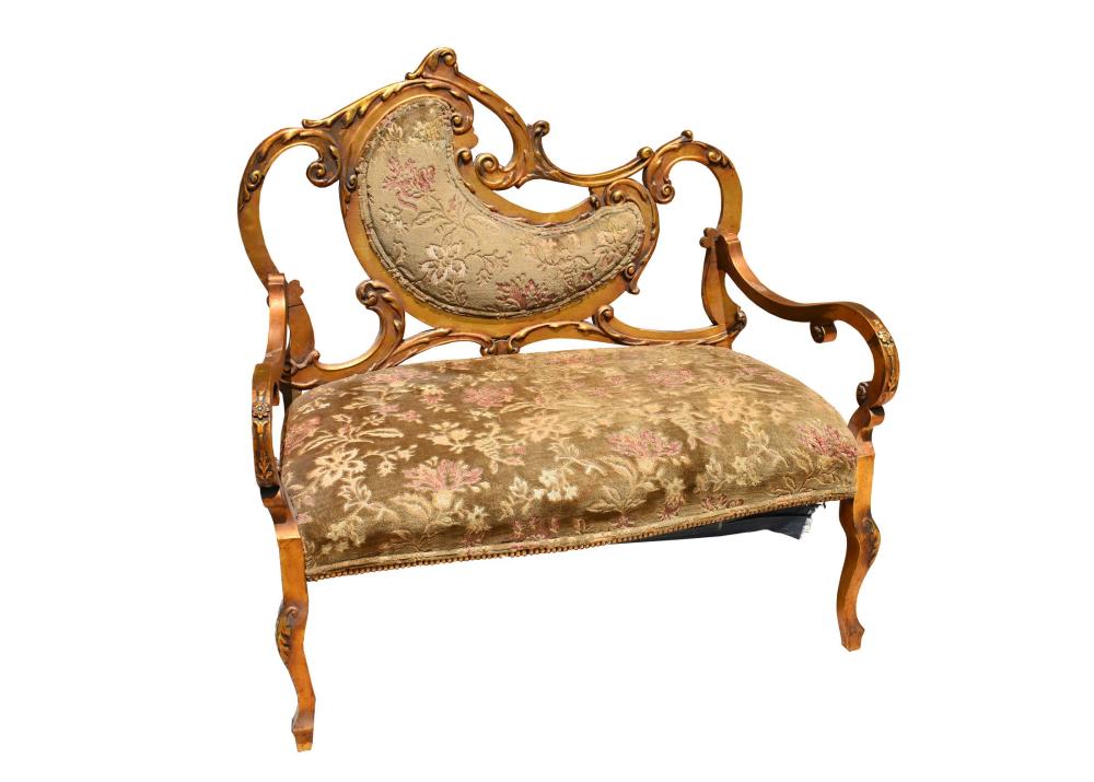 Appraisal: FRENCH ROCOCO STYLE GILTWOOD SETTEEThe asymmetrical partially padded and open