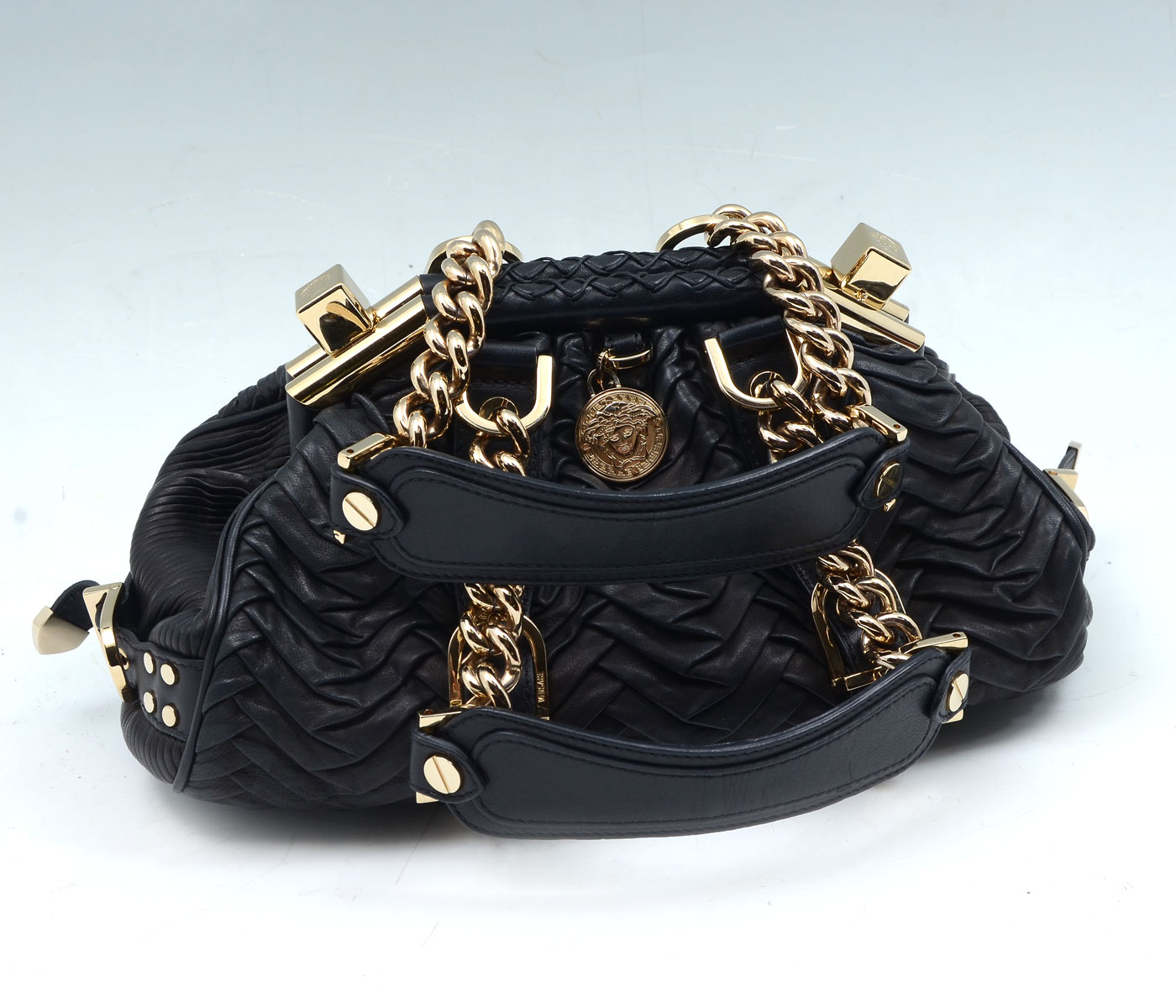 Appraisal: VERSACE CHEVRON FOLDED LEATHER BAG WITH GOLD ACCENTS Classic Versace