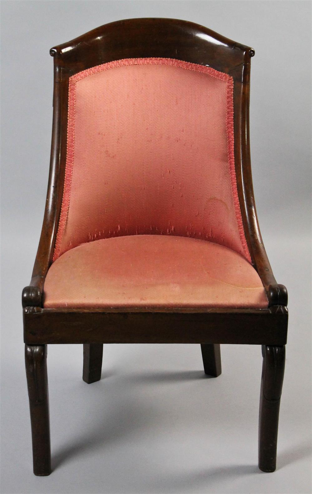 Appraisal: VICTORIAN MAHOGANY SPOONBACK CHAIR WITH ROSE SILK UPHOLSTERY having an